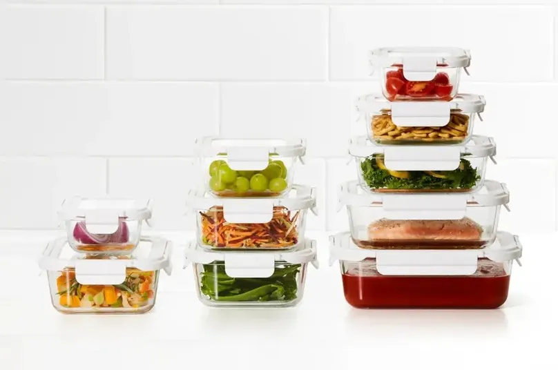 Airtight food storage containers filled with fresh food.