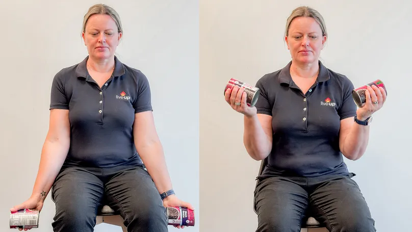 Image of woman doing seated bicep curls