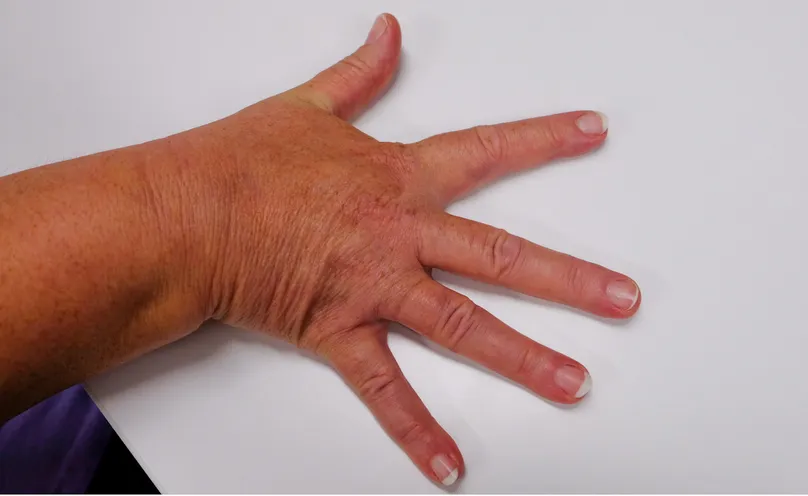 A hand with all fingers splayed out.