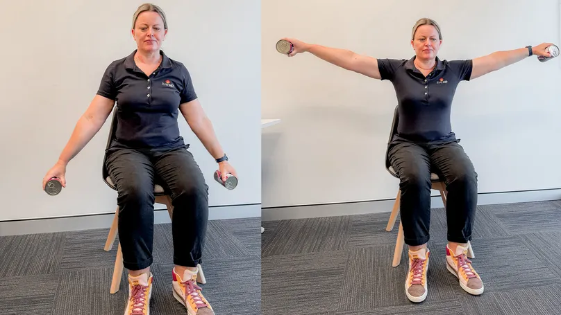 woman doing seated lateral raises
