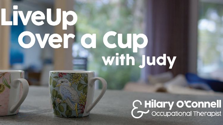 Video title card with two cups on a kitchen bench.