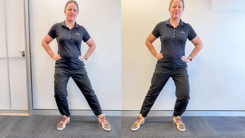 A woman swaying on her feet from side to side.