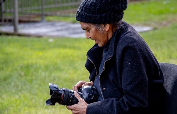 Barbara McGrady sitting looking at a camera