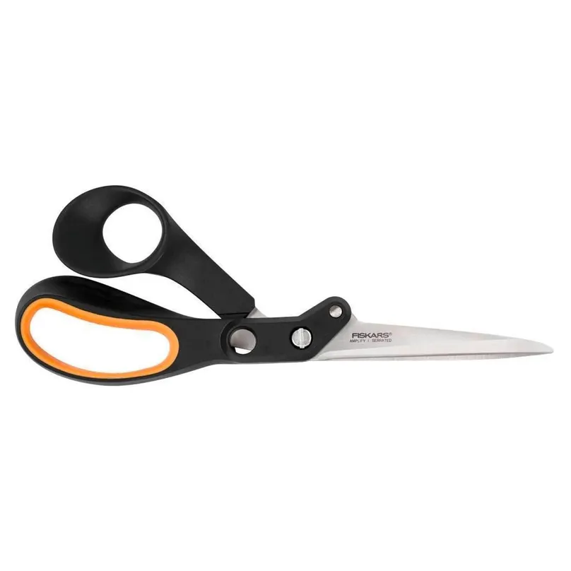 A closed pair of large-handled scissors.