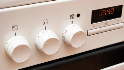 Close up of big round oven dials.