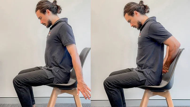 man sitting reverse arm hold
